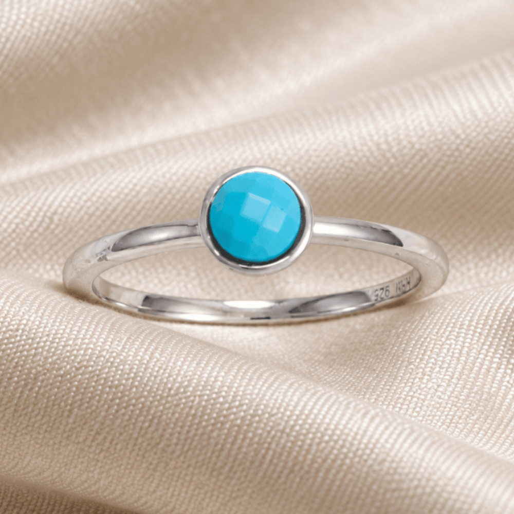 Rhodium Plated Round Faceted Turquoise Ring