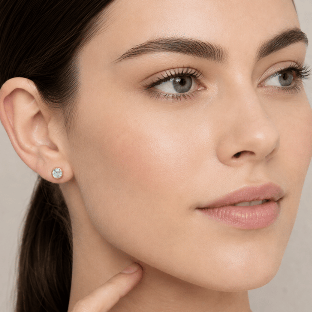 14 Karat Gold Plated Silver Blue Topaz Stud Earrings
