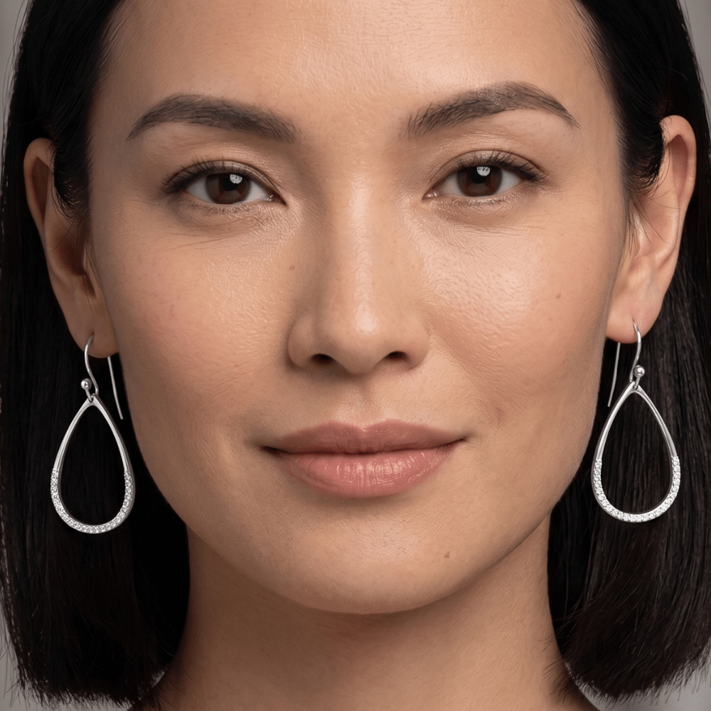 Rhodium Plated CZ Pear Drop Earrings